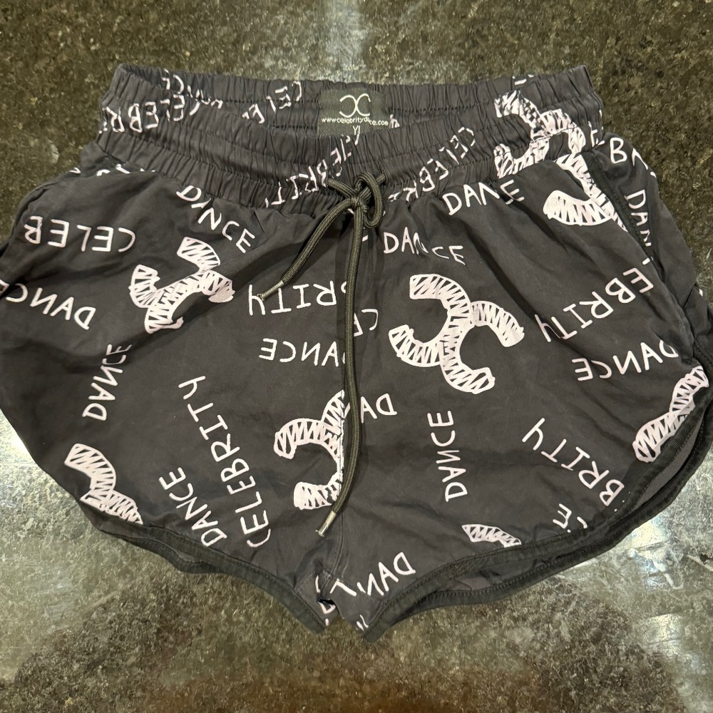 Celebrity athletic girls Youth Large black shorts with white writing see picture